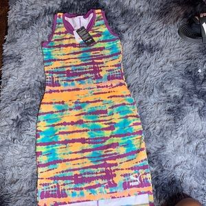 This is a puma dress never worn with price tags. Size small in women’s